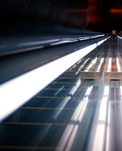 Stacked aluminium rods in a scrap yard