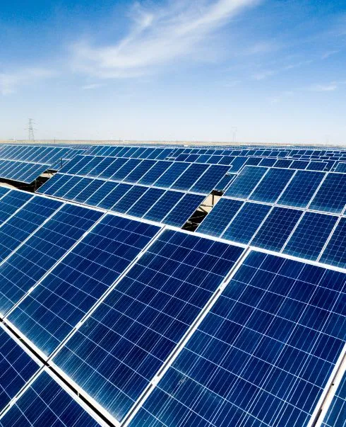 Logs of steel stacked in a scrap yard